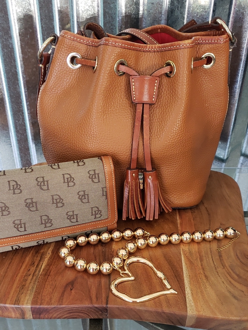 Dooney & Bourke Cognac Pebbled Leather Drawstring Bucket Bag